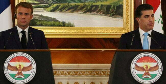 הנשיא הצרפתי עמנואל מקרון משתתף במסיבת עיתונאים עם נשיא כורדיסטאן העיראקית, נצ'ירוואן ברזאני, 2021. צילום: רויטרס