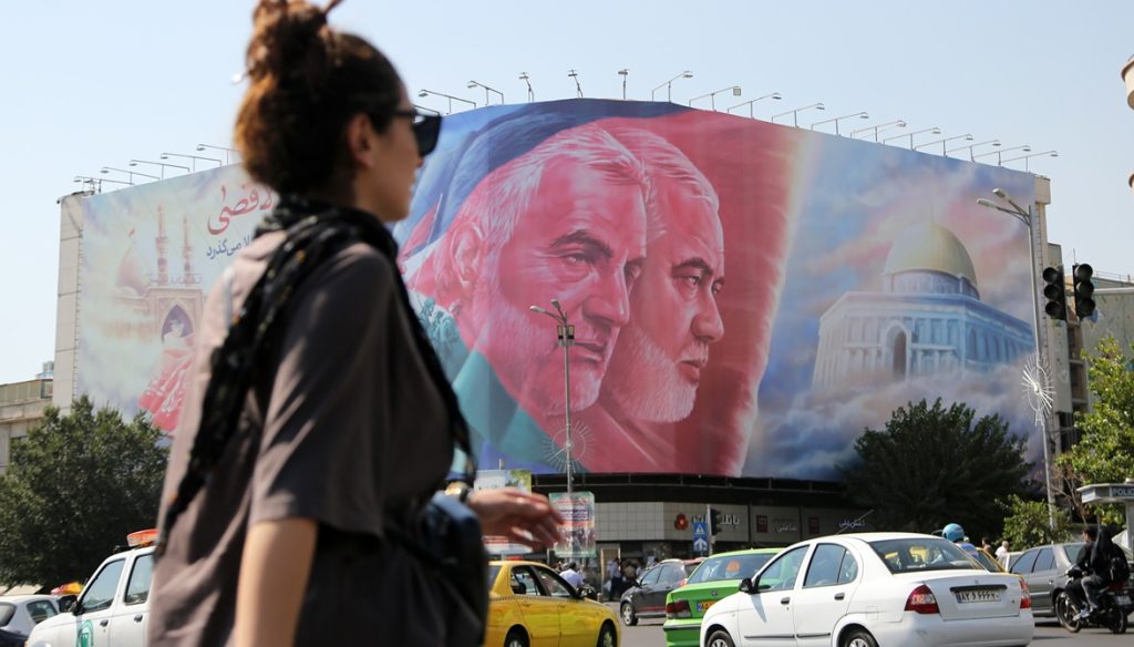 Posters of Soleimani and Haniyeh at Revolution Square in capital Tehran. Photo: Reuters