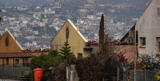 Houses in Metula and cars hit from missiles fired by Hezbollah. Photo: Flash 90